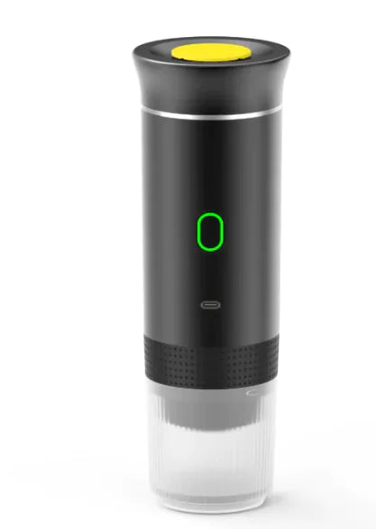 BrewGo portable electric capsule coffee maker brewing hot espresso with rich crema into a travel cup during a camping trip